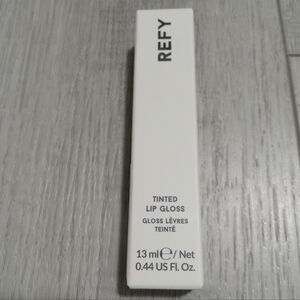 REFY Tinted Lip Gloss in White Packaging